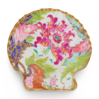 Decorative skull-shaped plate with floral design on a white background