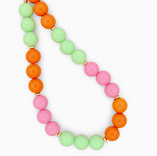 Necklace with colorful beads on a white background